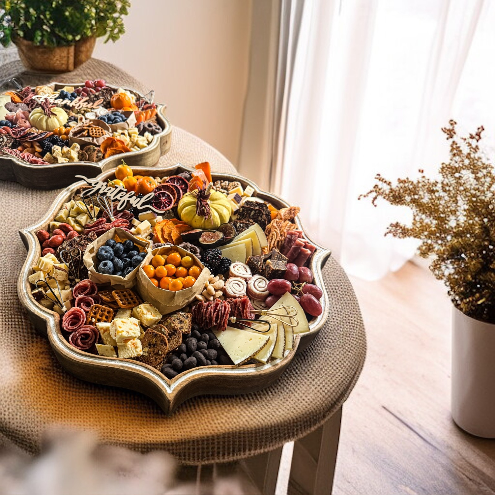 An elegant charcuterie board styled on a table
